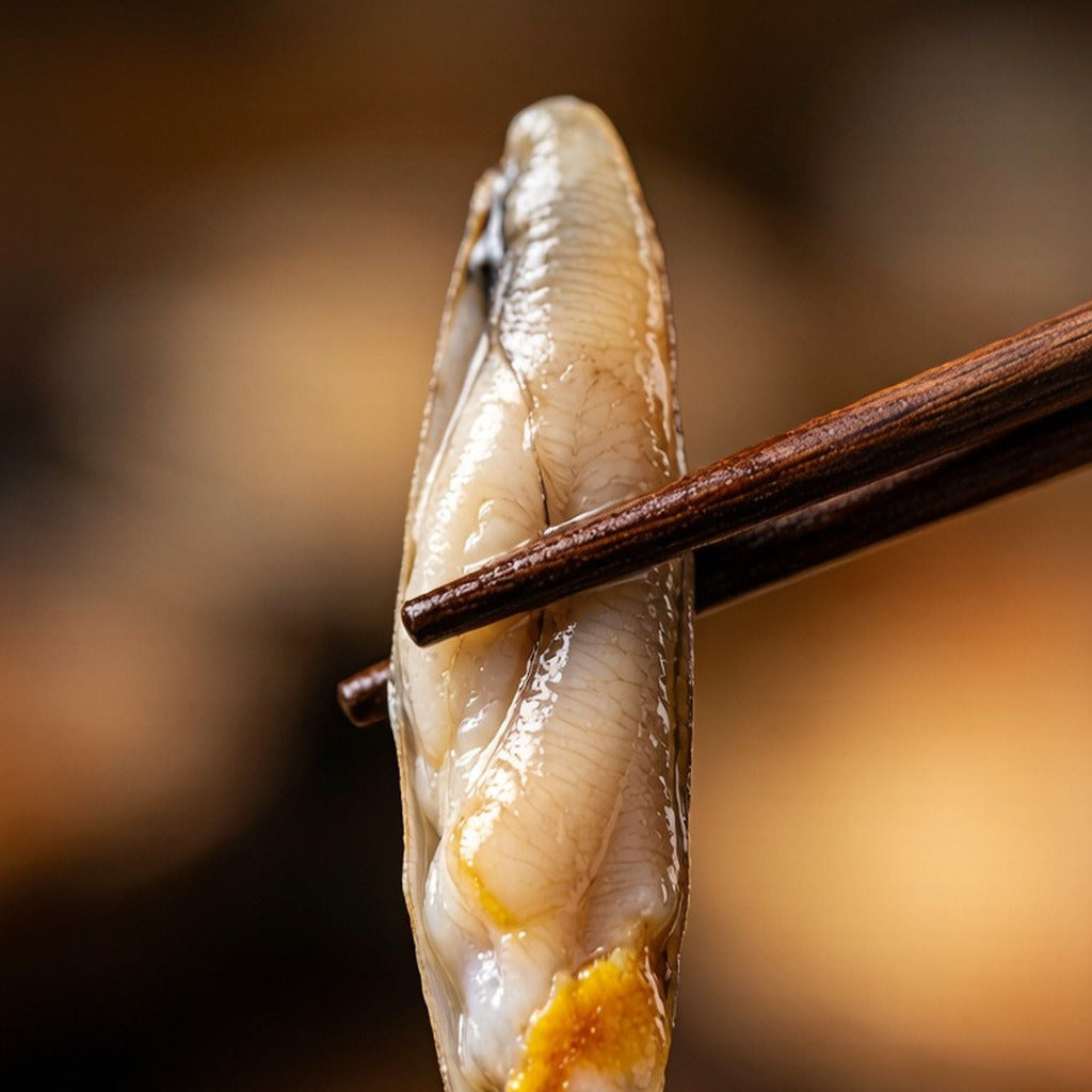 Jumbo razor clam meat plated on the counter